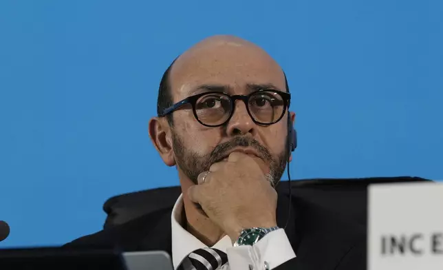 Chair of the International Negotiating Committee Luis Vayas Valdivieso reacts during a plenary of the fifth session of the Intergovernmental Negotiating Committee on Plastic Pollution in Busan, South Korea, Sunday, Dec. 1, 2024. (AP Photo/Ahn Young-joon)