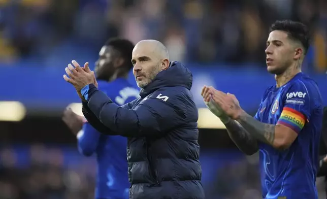 Chelsea's head coach Enzo Maresca celebrates after the English Premier League soccer match between Chelsea and Aston Villa at the Stamford Bridge stadium in London, Sunday, Dec. 1, 2024. (AP Photo/Kirsty Wigglesworth)