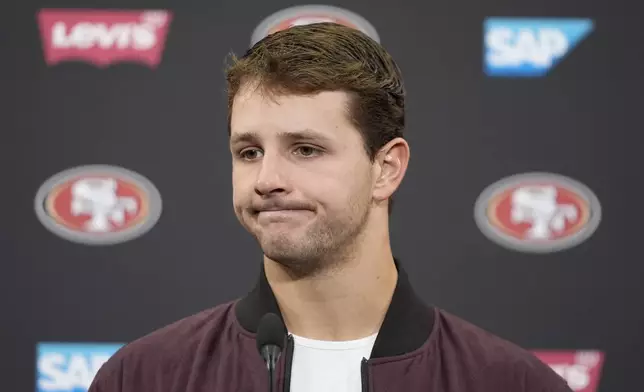 San Francisco 49ers quarterback Brock Purdy speaks at a news conference after an NFL football game against the Los Angeles Rams in Santa Clara, Calif., Thursday, Dec. 12, 2024. (AP Photo/Godofredo A. Vásquez)