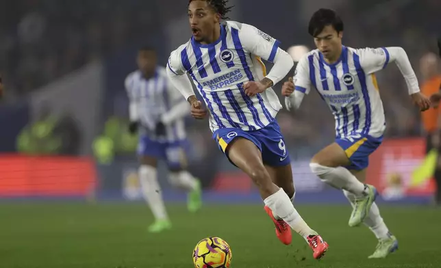 Brighton and Hove Albion's Joao Pedro during the English Premier League soccer match between Brighton &amp; Hove Albion and CF Brentford in Brighton and Hove, England, Friday, Dec 27, 2024. (Steven Paston/PA via AP)