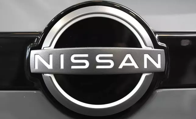 FILE - A Nissan logo is displayed on a Nissan Pathfinder SUV at the Pittsburgh International Auto Show in Pittsburgh, Feb. 15, 2024. (AP Photo/Gene J. Puskar, File)