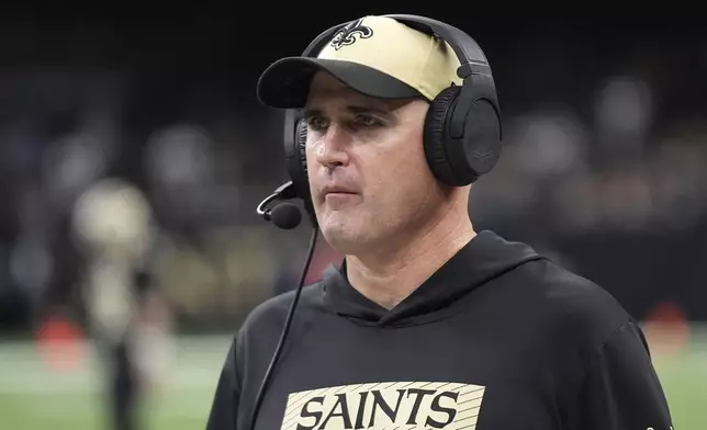 New Orleans Saints interim head coach Darren Rizzi watches from the sideline during the second half of an NFL football game against the Las Vegas Raiders, Friday, Nov. 29, 2024, in New Orleans. (AP Photo/Gerald Herbert)