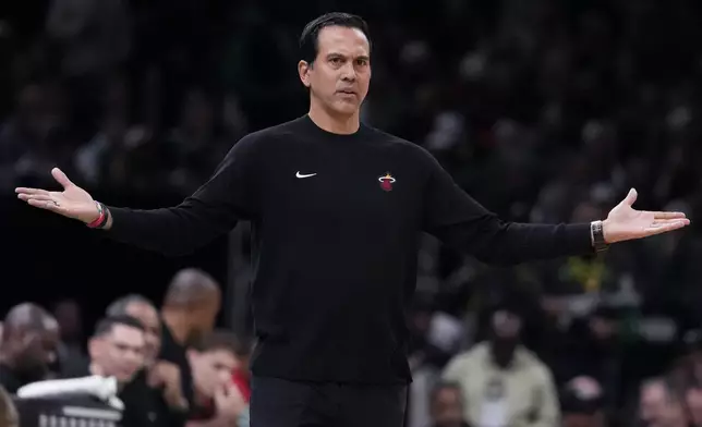 Miami Heat head coach Erik Spolestra questions a call during the first half of an NBA basketball game against the Boston Celtics, Monday, Dec. 2, 2024, in Boston. (AP Photo/Charles Krupa)