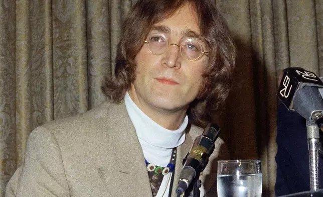 FILE - Singer John Lennon appears during a press conference at the Hotel Americana on May 13, 1968, in New York. (AP Photo, File)