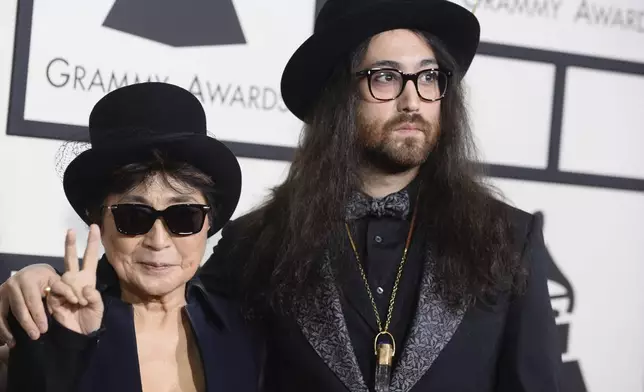 FILE - Yoko Ono, wife of the late John Lennon, left, and their son Sean Lennon arrive at the 56th annual Grammy Awards in Los Angeles on Jan. 26, 2014. (Photo by Jordan Strauss/Invision/AP, File)