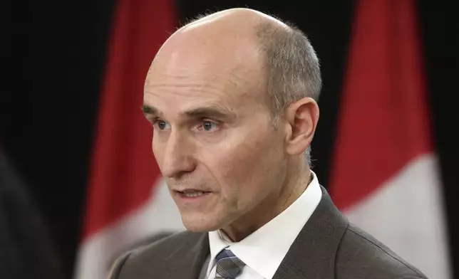 Canada Minister of Public Services and Procurement Jean-Yves Duclos speaks at a press conference on new measures to strengthen gun control in Ottawa, Ontario, on Thursday, Dec. 5, 2024. (Patrick Doyle/The Canadian Press via AP)