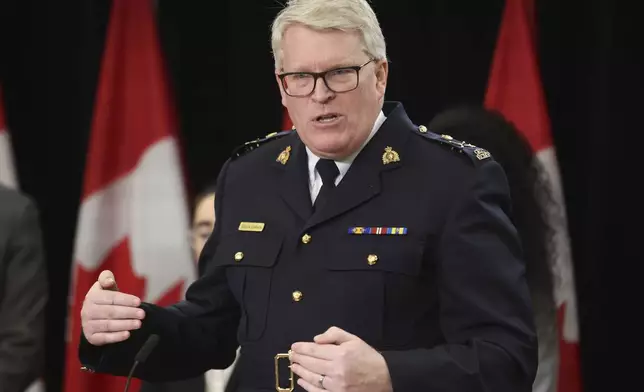 Canada RCMP Deputy Commissioner Bryan Larkin speaks at a press conference on new measures to strengthen gun control in Ottawa, Ontario, on Thursday, Dec. 5, 2024. (Patrick Doyle/The Canadian Press via AP)