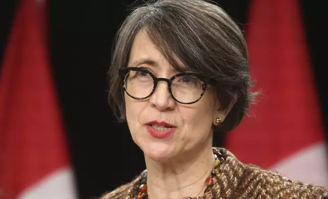 Gun control advocate and survivor of the1989 Ecole Polytechnique massacre Nathalie Provost speaks at a press conference on new measures to strengthen gun control in Ottawa, Ontario, on Thursday, Dec. 5, 2024. (Patrick Doyle/The Canadian Press via AP)