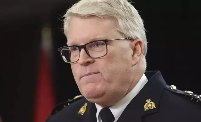 Canada CMP Deputy Commissioner Bryan Larkin speaks at a press conference on new measures to strengthen gun control in Ottawa, Ontario, on Thursday, Dec. 5, 2024. (Patrick Doyle/The Canadian Press via AP)