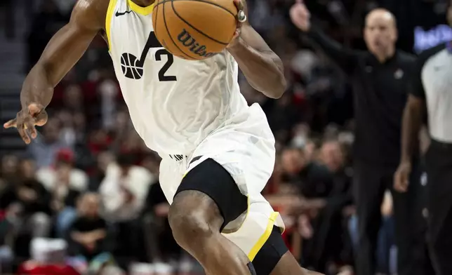 Utah Jazz guard Collin Sexton drives to the hoop against the Portland Trail Blazers during the second half of an NBA basketball game Thursday, Dec. 26, 2024, in Portland, Ore. (AP Photo/Howard Lao)