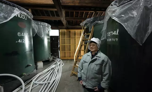 Mie Takahashi, "toji," or sake brewer, of the Koten sake brewery, speaks during an interview with The Associated Press at the brewery in Okaya, central Japan, Saturday, Nov. 30, 2024. (AP Photo/Hiro Komae)