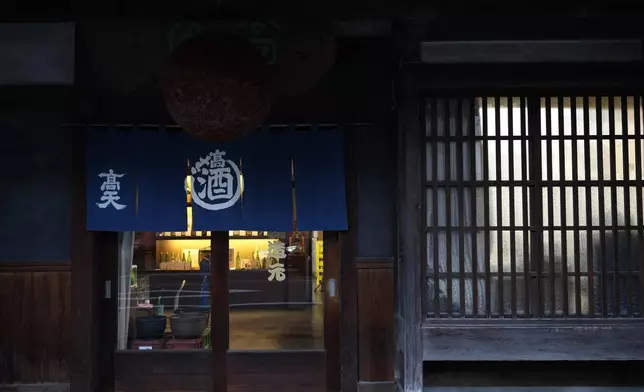 The storefront of the Koten sake brewery is seen in Okaya, central Japan, Friday, Nov. 29, 2024. (AP Photo/Hiro Komae)