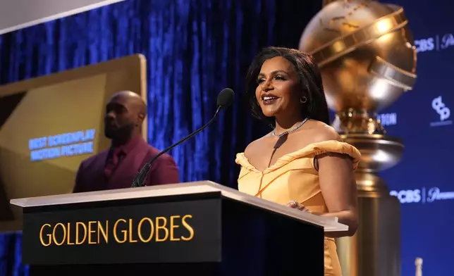 Mindy Kaling, right, speaks as Morris Chestnut looks on during the nominations for the 82nd Golden Globes on Monday, Dec. 9, 2024, at the Beverly Hilton Hotel in Beverly Hills, Calif. The 82nd Golden Globes will be held on Sunday, Jan. 5, 2025. (AP Photo/Chris Pizzello)