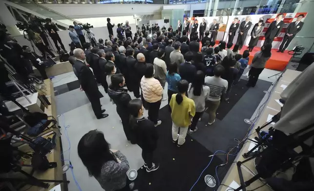 Participants attend the end of a ceremony to conclude the year's trading at the Tokyo Stock Exchange Monday, Dec. 30, 2024, in Tokyo. (AP Photo/Eugene Hoshiko)