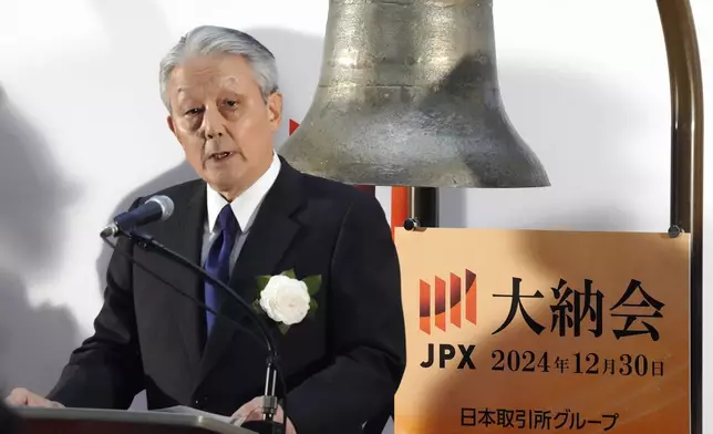 Hiromi Yamaji, CEO of Japan Exchange Group (JPX) delivers a speech at the end of a ceremony to conclude the year's trading at the Tokyo Stock Exchange Monday, Dec. 30, 2024, in Tokyo. (AP Photo/Eugene Hoshiko)