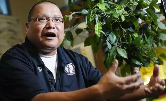 Jason Jones, cultural success coach and care center manager, talks about the care center at San Carlos High School Tuesday, Aug. 27, 2024, in San Carlos, Ariz. (AP Photo/Ross D. Franklin)