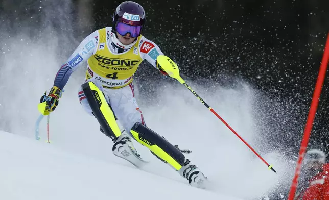 Norway's Atle Lie McGrath competes during an alpine ski, men's World Cup slalom, in Alta Badia, Italy, Monday, Dec. 23, 2024. (AP Photo/Alessandro Trovati)