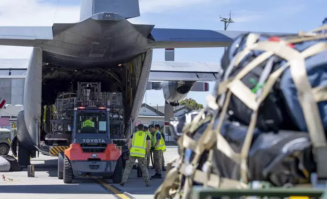 A Royal New Zealand Air Force Hercules C130 H is loaded up with supplies to deliver to Vanuatu, in Auckland, New Zealand, Wednesday, Dec. 18, 2024, following a strong earthquake that struck just off the coast of Vanuatu in the South Pacific Ocean, Tuesday, Dec. 17. (SGT Maria Eves/New Zealand Defence Force via AP)