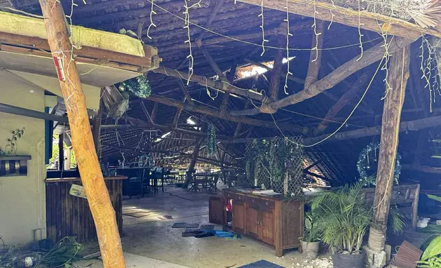 The inside of a building damaged is seen in Port Vila, Vanuatu, following a powerful earthquake Tuesday, Dec. 17, 2024. (Tim Cutler via AP)