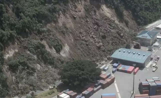 This image made from a video shows a landslide near an international shipping terminal in Port Vila, Vanuatu following a powerful earthquake Tuesday, Dec. 17, 2024. (Dan McGarry via AP)