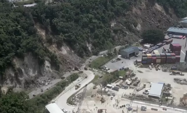 This image made from a video shows a landslide near an international shipping terminal in Port Vila, Vanuatu following a powerful earthquake Tuesday, Dec. 17, 2024. (Dan McGarry via AP)