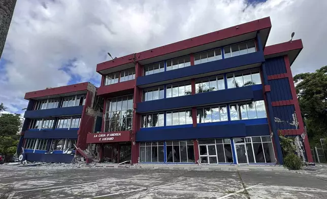 A building is seen damaged in Port Vila, Vanuatu following a powerful earthquake Tuesday, Dec. 17, 2024. (Tim Cutler via AP)