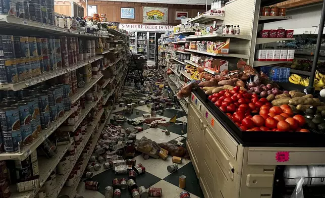 Drinks and other food items are toppled on the floor inside Hoby's Market and Deli after a 7.0 magnitude earthquake Thursday, Dec. 5, 2024, in Scotia, Calif. (Dylan McNeill/The Times-Standard via AP)