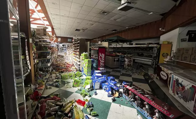 Drinks and other food items are toppled on the floor inside Hoby's Market and Deli after an earthquake Thursday, Dec. 5, 2024, in Scotia, Calif. (Dylan McNeill/The Times-Standard via AP)