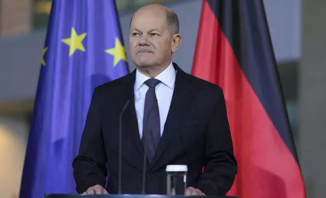 German Chancellor Olaf Scholz makes a statement after formally asking for a vote of confidence in parliament, to set the path for an early election in spring 2025, at the chancellery in Berlin, Germany, Wednesday, Dec. 11, 2024. (AP Photo/Markus Schreiber)