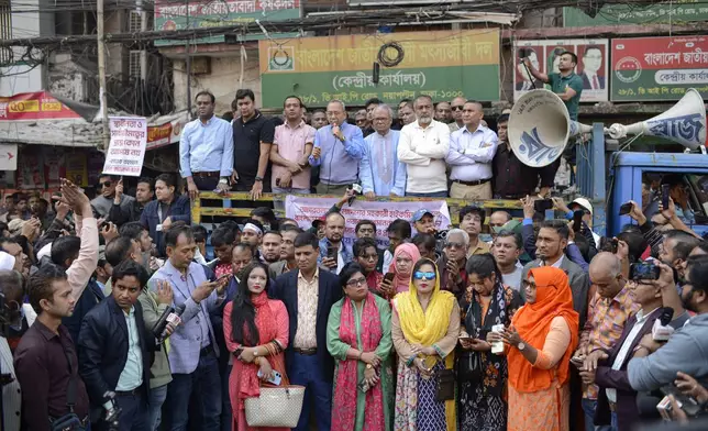 Supporters of Bangladesh's former Prime Minister Khaleda Zia and her Bangladesh Nationalist Party (BNP) participate in an anti-India protest in Dhaka, Bangladesh, Sunday, Dec. 8, 2024. (AP Photo/Mahmud Hossain Opu)