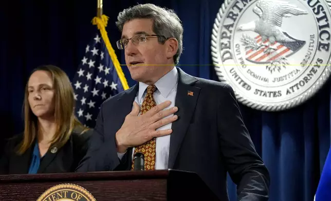 U.S. Attorney District of Massachusetts Joshua Levy, right, faces reporters as Special Agent in Charge FBI, Boston Division Jodi Cohen, left, looks on during a news conference, Monday, Dec. 16, 2024, at the federal courthouse, in Boston. (AP Photo/Steven Senne)