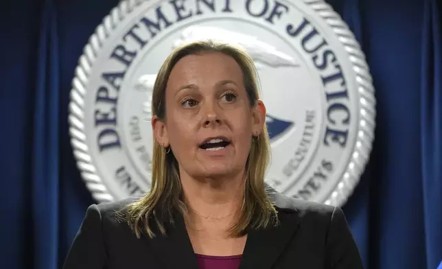 Christine Chambers, Assistant Special Agent in Charge U.S. Department of Commerce's Office of Export Enforcement, Boston Field Office, faces reporters during a news conference, Monday, Dec. 16, 2024, at the federal courthouse, in Boston. (AP Photo/Steven Senne)