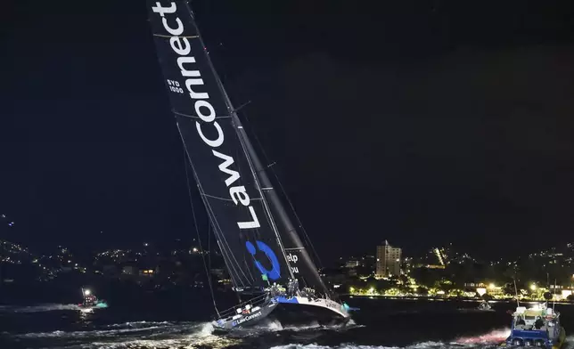 Law Connect sails down the Derwent River to win line honours in the Sydney to Hobart yacht race in Hobart, Australia, Saturday, Dec. 28, 2024. (Salty Dingo via AP)