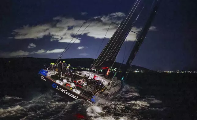 Law Connect sails down the Derwent River to win line honours in the Sydney to Hobart yacht race in Hobart, Australia, Saturday, Dec. 28, 2024. (Salty Dingo via AP)