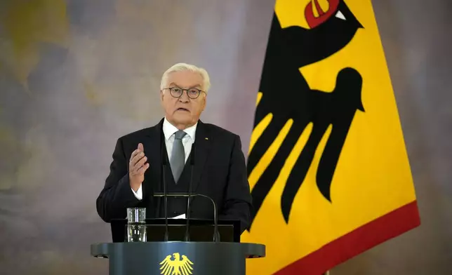 German President Frank-Walter Steinmeier announces the decision to dissolve the German Bundestag and schedule a new election for February 23 next year, in Berlin, Friday, Dec. 27, 2024. (AP Photo/Ebrahim Noroozi)