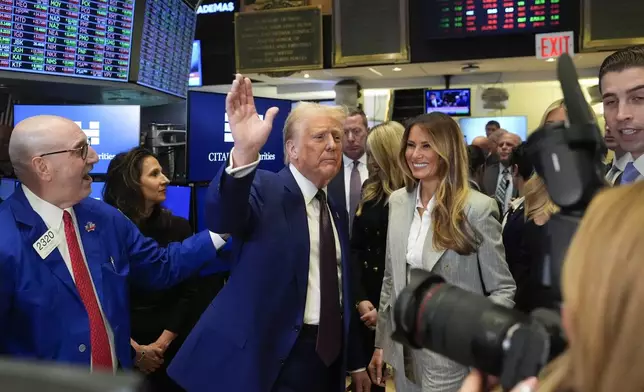 President-elect Donald Trump walks the floor of the New York Stock Exchange, Thursday, Dec. 12, 2024, in New York. (AP Photo/Alex Brandon)