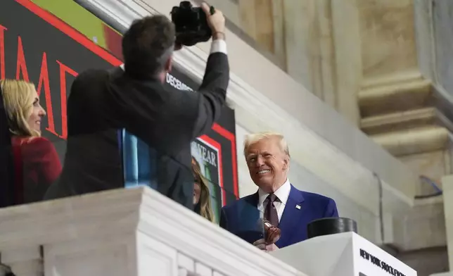 President-elect Donald Trump pauses for a photograph after ringing the opening bell at the New York Stock Exchange, Thursday, Dec. 12, 2024, in New York. (AP Photo/Alex Brandon)