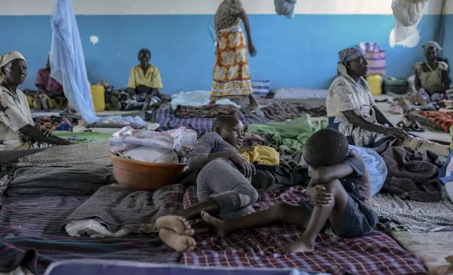 Residents take refugee at Ombaka Primary School after fleeing floodwaters in Ombaka Village, Kisumu, Kenya, April 17, 2024. (AP Photo/Brian Ongoro)