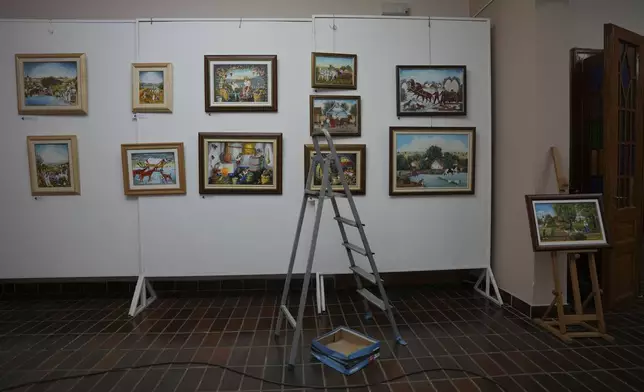 Various paintings in the Gallery of naive art in the village of Kovacica, Serbia, Thursday, Nov. 28, 2024. (AP Photo/Darko Vojinovic)