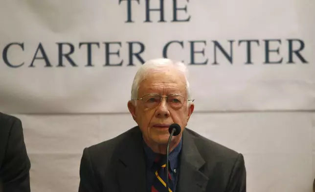 FILE - Former U.S. President Jimmy Carter speaks at a news conference in Katmandu, Nepal, on April 1, 2013. (AP Photo/Niranjan Shrestha, File)