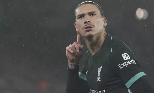 Liverpool's Darwin Nunez celebrates after scoring during the English Football Lague Cup soccer match between Southampton and Liverpool in Southampton, England, on Wednesday, Dec.18, 2024. (AP Photo/Sean Ryan)