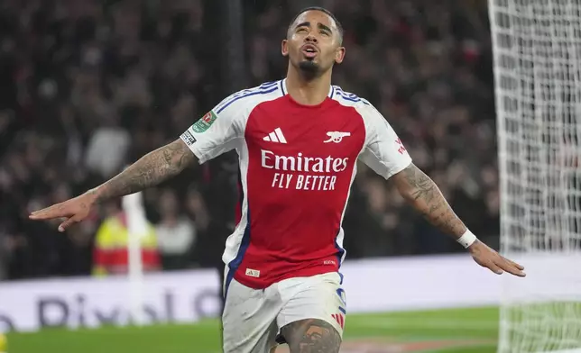 Arsenal's Gabriel Jesus celebrates after scoring his side's second goal during the English League Cup quarterfinal soccer match between Arsenal and Crystal Palace at Emirates stadium, in London, Wednesday, Dec. 18, 2024. (AP Photo/Kirsty Wigglesworth)