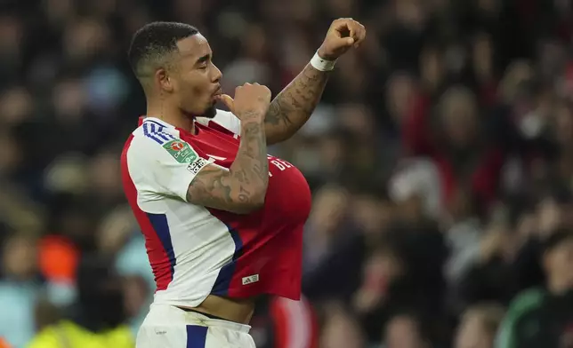 Arsenal's Gabriel Jesus celebrates after scoring his side's second goal during the English League Cup quarterfinal soccer match between Arsenal and Crystal Palace at Emirates stadium, in London, Wednesday, Dec. 18, 2024. (AP Photo/Kirsty Wigglesworth)