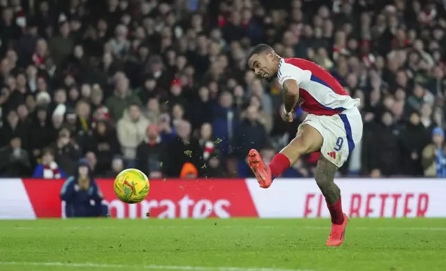 Arsenal's Gabriel Jesus scores a hat-trick and his side's third goal during the English League Cup quarterfinal soccer match between Arsenal and Crystal Palace at Emirates stadium, in London, Wednesday, Dec. 18, 2024. (AP Photo/Kirsty Wigglesworth)