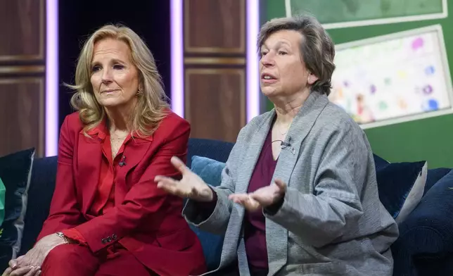 First lady Jill Biden, left, listens while Randi Weingarten, president of American Federation of Teachers, right, speaks during a virtual thank you event for educators with the American Federation of Teachers and the National Education Association, in the South Court Auditorium on the White House complex in Washington, Monday, Dec. 16, 2024. (AP Photo/Rod Lamkey, Jr.)