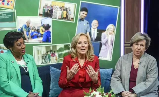 First lady Jill Biden, center, is joined by Becky Pringle, president of National Education Association, left, and Randi Weingarten, president of American Federation of Teachers , right, during a virtual thank you event for educators with the American Federation of Teachers and the National Education Association, in the South Court Auditorium on the White House complex in Washington, Monday, Dec. 16, 2024. (AP Photo/Rod Lamkey, Jr.)