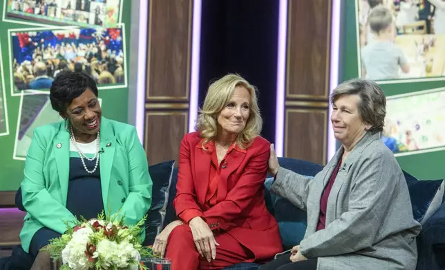 First lady Jill Biden, center, is joined by Becky Pringle, president of National Education Association, left, and Randi Weingarten, president of American Federation of Teachers , right, during a virtual thank you event for educators with the American Federation of Teachers and the National Education Association, in the South Court Auditorium on the White House complex in Washington, Monday, Dec. 16, 2024. (AP Photo/Rod Lamkey, Jr.)