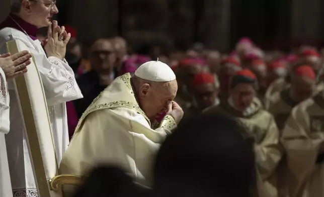 Pope Francis celebrates a Christmas Eve Mass on the day the Pope opens the Holy Door to mark the opening of the 2025 Catholic Holy Year, or Jubilee, in St. Peter's Basilica, at the Vatican, Dec. 24, 2024. (Remo Casilli/Pool Photo via AP)