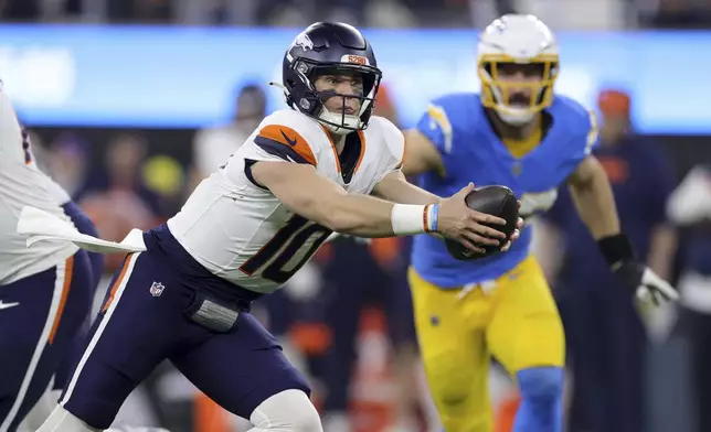 Denver Broncos quarterback Bo Nix (10) drops back to try a handoff during the first half an NFL football game against the Los Angeles Chargers, Thursday, Dec. 19, 2024, in Inglewood, Calif. (AP Photo/Ryan Sun)