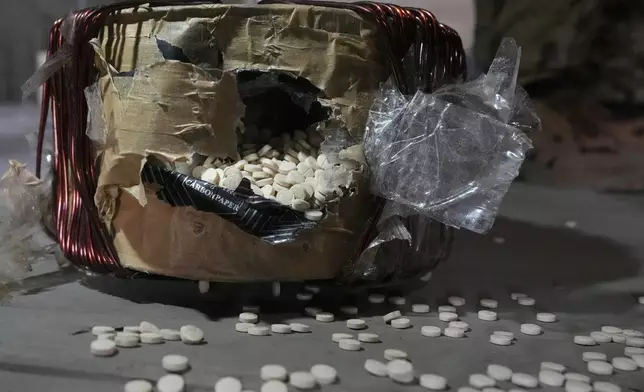 Amphetamine pills, known as Captagon, hidden inside an electrical component at the warehouse where the drug was manufactured before the fall of Bashar Assad government at a facility in Douma city, outskirts of Damascus, Syria, Friday, Dec. 13, 2024. (AP Photo/Hussein Malla)